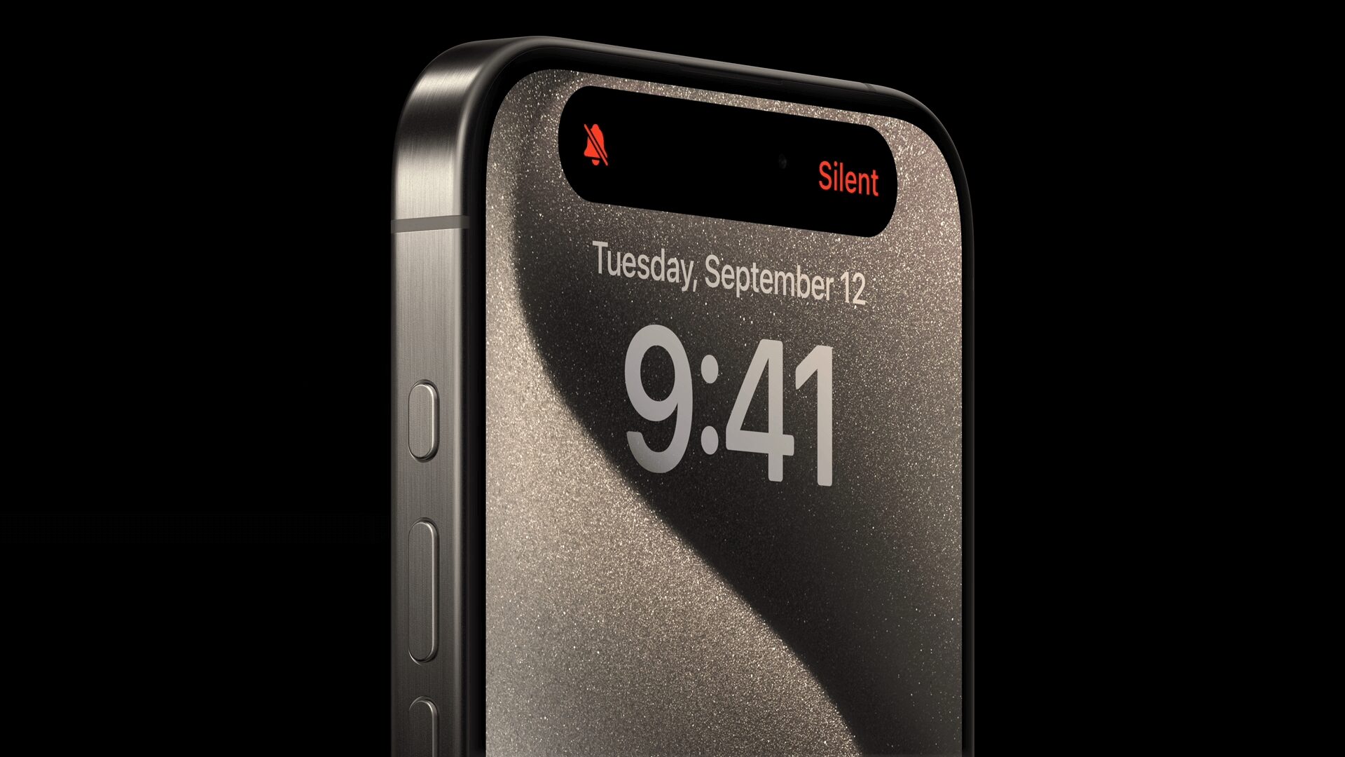Close do iPhone 15 Pro com Dynamic Island e modo silencioso ativado